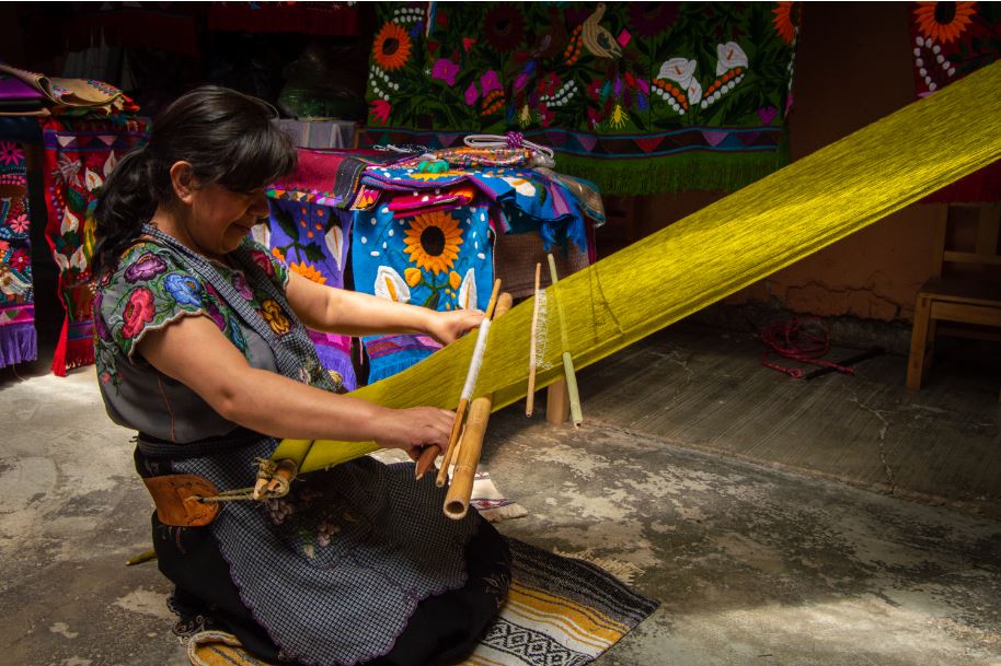 Mexican wool weavers make beautiful textiles for souvenirs 